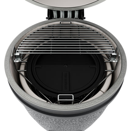 The Bastard kamado PRO Large Solo Graphite bovenaanzicht met geopende deksel en zicht op de cast iron shield / deflector